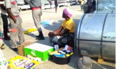 Security guards attempt to chase vendors off streets